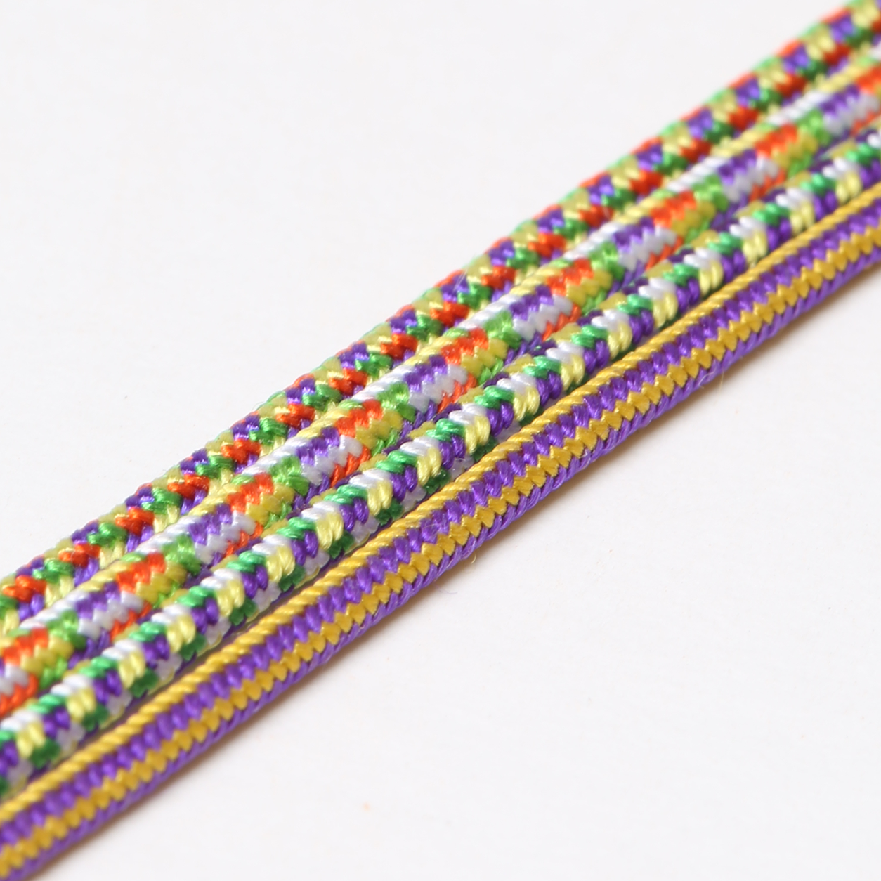 Orange, yellow, purple, and green Japanese silk thread